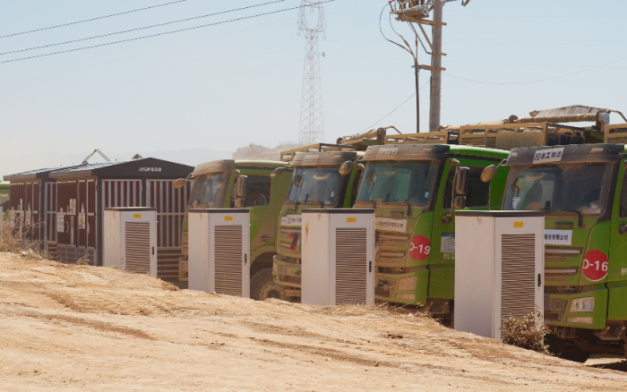 沉大项目进行时！bti体育新能源自卸车打造“绿色基建”新范式